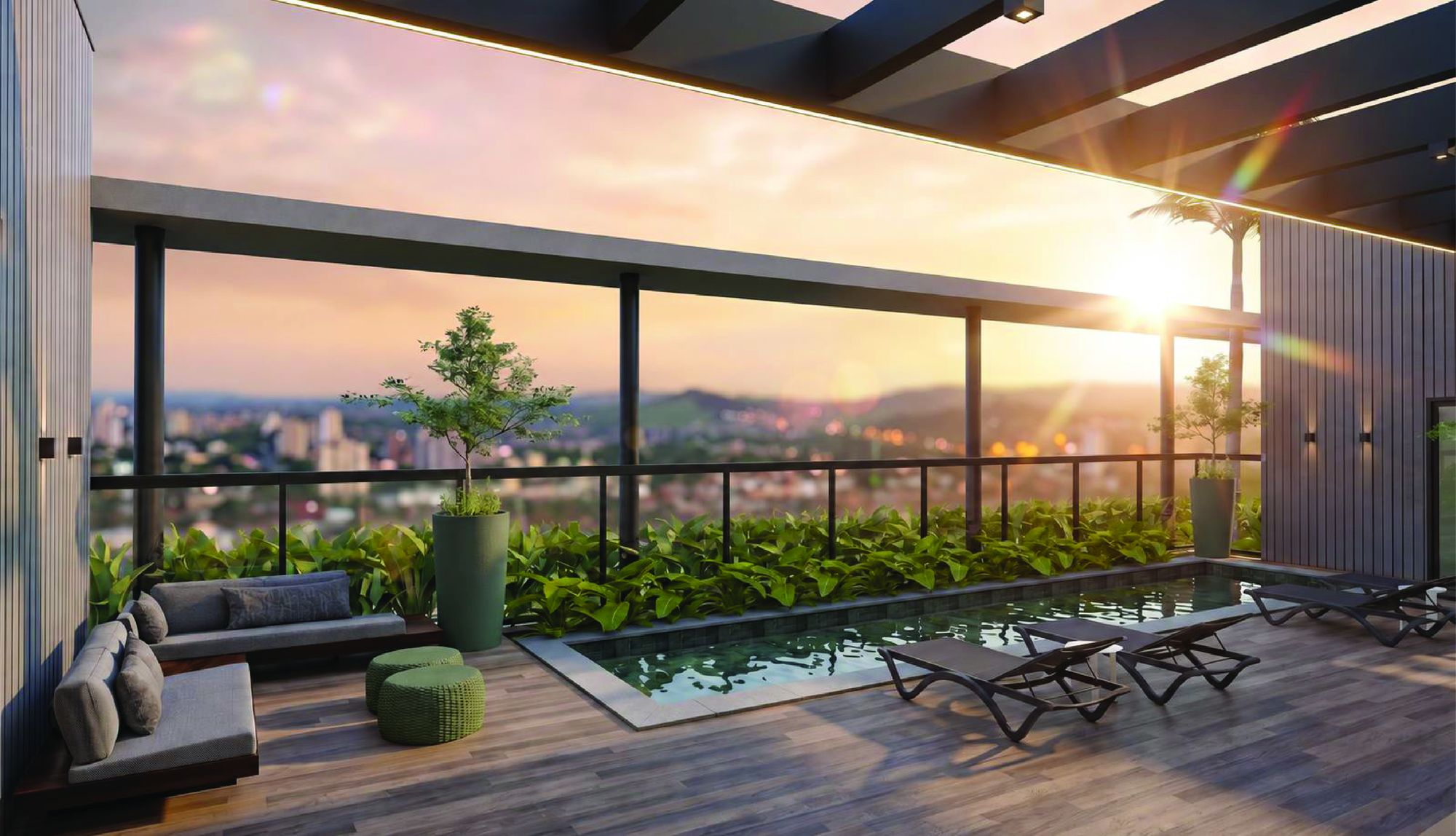 Deck do rooftop do Connect Studios ao entardecer, com vista para Cuiabá